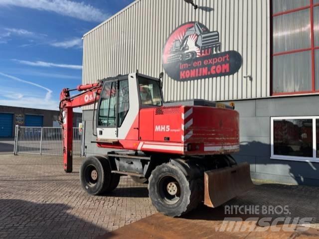 O&K MH 5 Compact Kabīnes un interjers