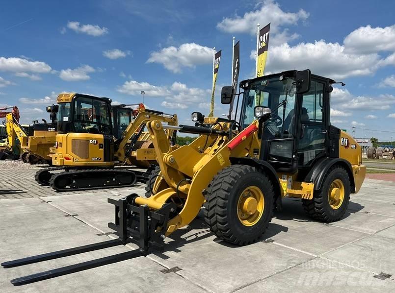 CAT 906 Iekrāvēji uz riteņiem