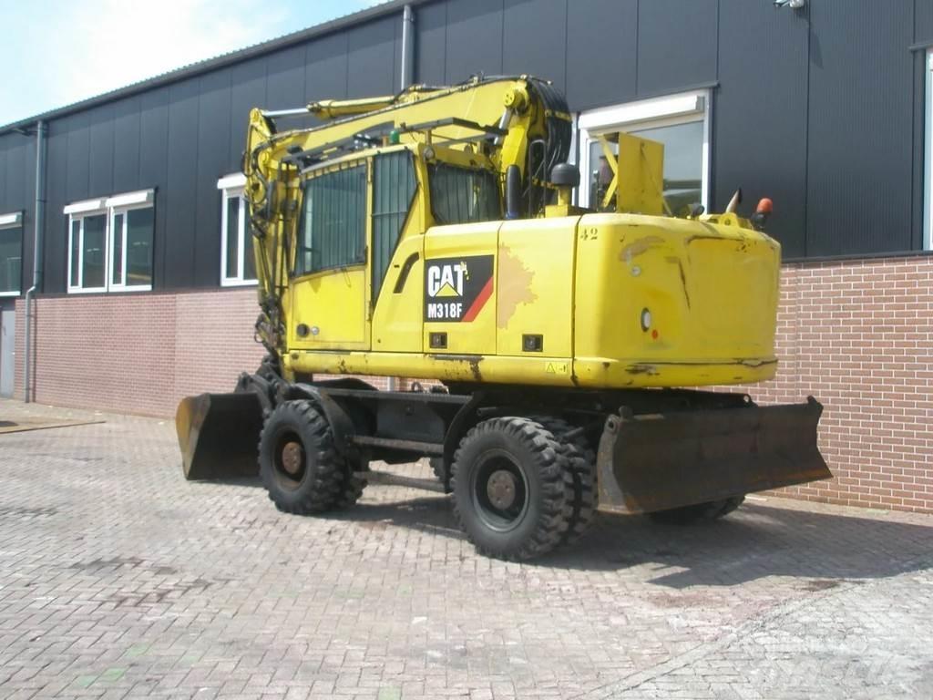 CAT M318F Ekskavatori uz riteņiem