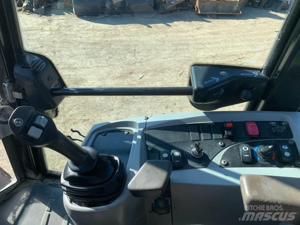 CAT 908H Iekrāvēji uz riteņiem