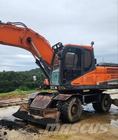 Doosan DX 210 W Ekskavatori uz riteņiem