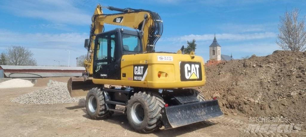 CAT M 313 D Ekskavatori uz riteņiem
