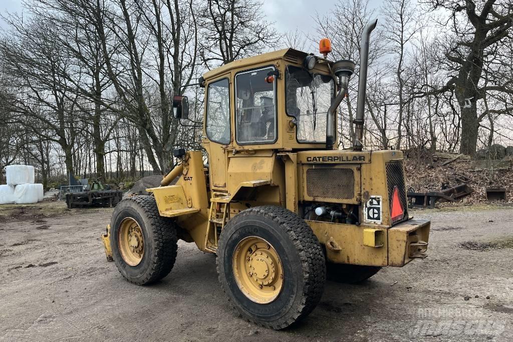 CAT 910 Iekrāvēji uz riteņiem
