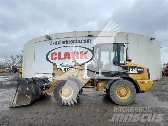CAT 906M Iekrāvēji uz riteņiem