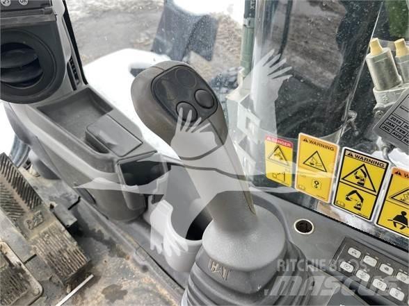 CAT M318D Ekskavatori uz riteņiem
