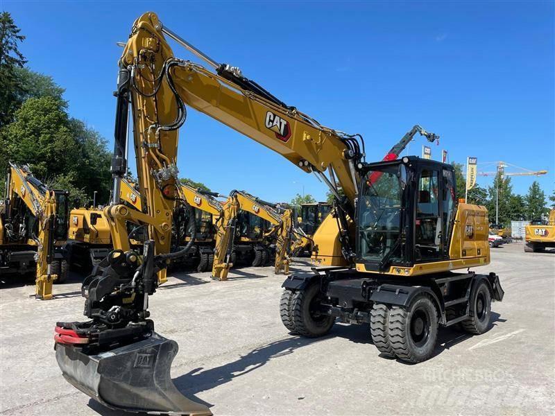 CAT M314 Ekskavatori uz riteņiem