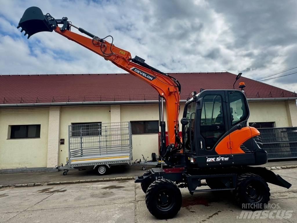 Develon DX 57 W-7 Ekskavatori uz riteņiem