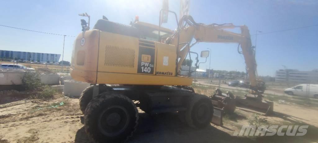 Komatsu PW 140-7 Ekskavatori uz riteņiem