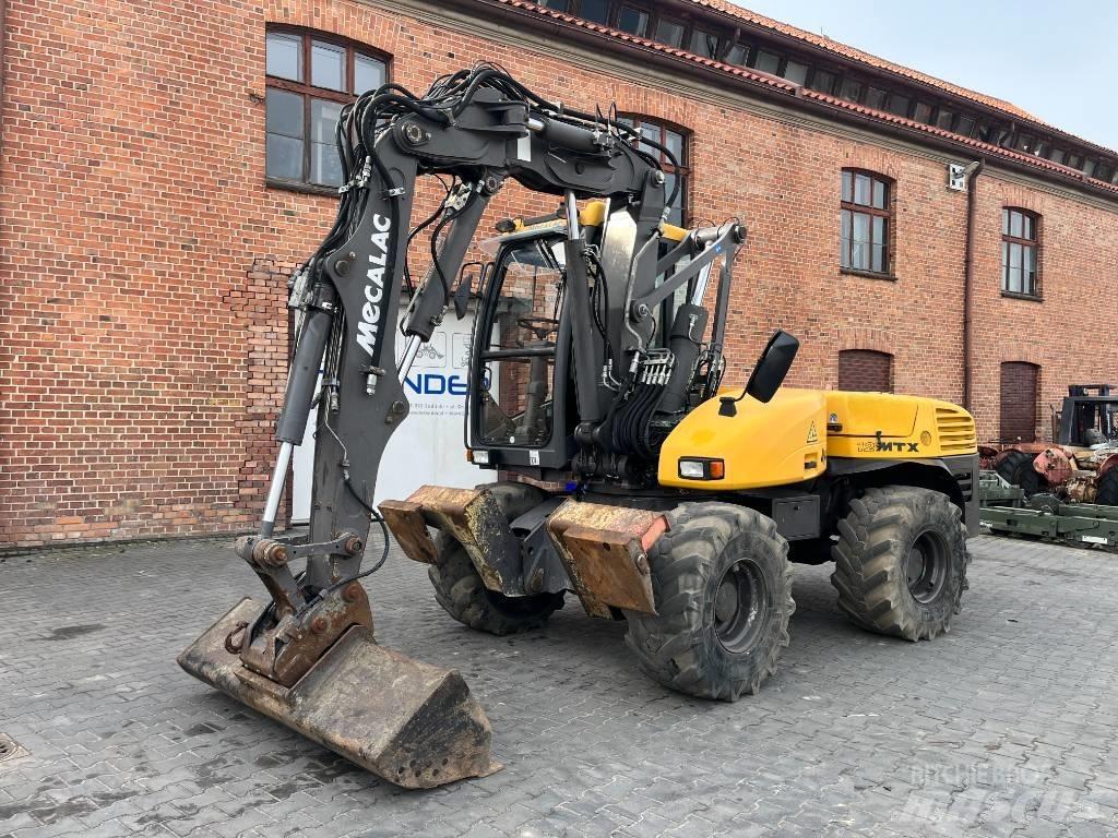 Mecalac 12 M TX Ekskavatori uz riteņiem