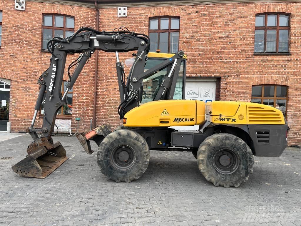 Mecalac 12 M TX Ekskavatori uz riteņiem