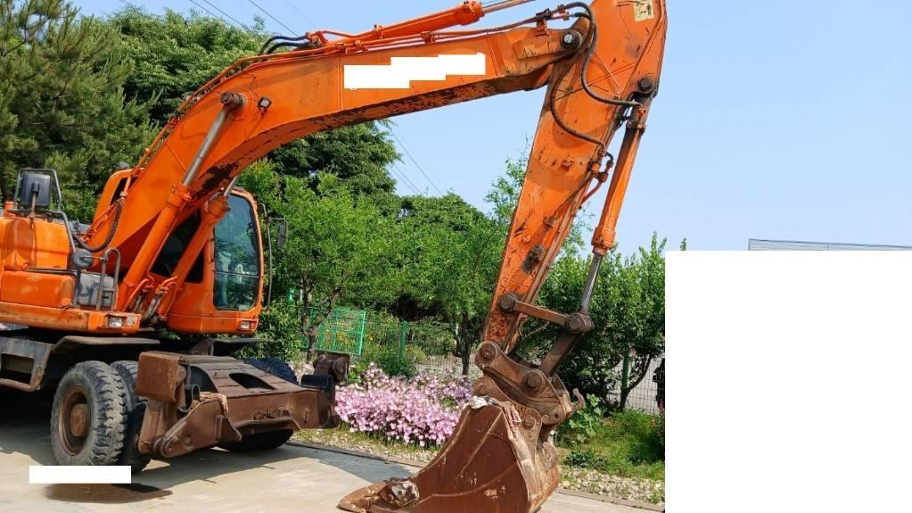 Doosan DX 210 W Ekskavatori uz riteņiem