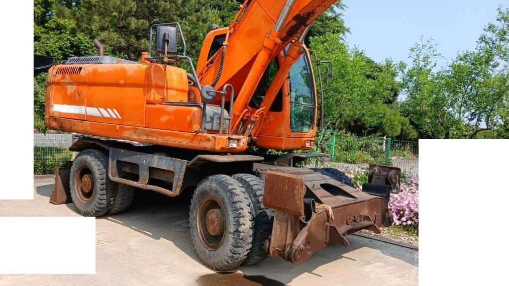 Doosan DX 210 W Ekskavatori uz riteņiem