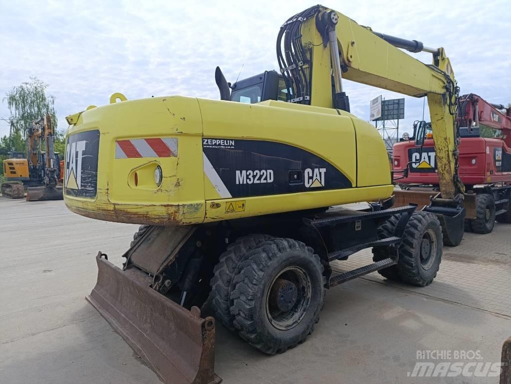 CAT M 322 D Ekskavatori uz riteņiem