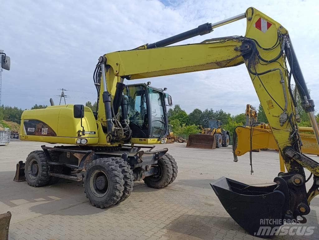 CAT M 322 D Ekskavatori uz riteņiem