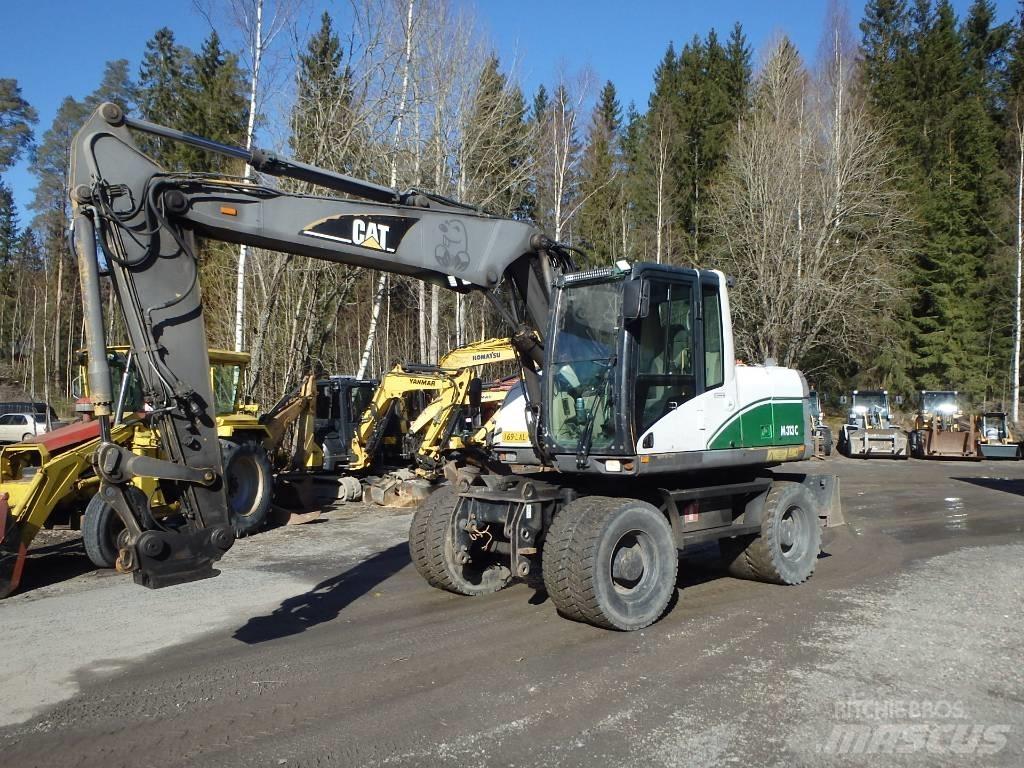 CAT M 313 C 4x4 Ekskavatori uz riteņiem