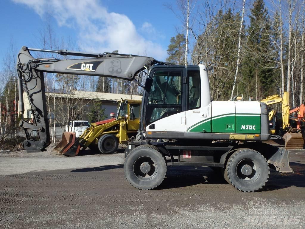 CAT M 313 C 4x4 Ekskavatori uz riteņiem