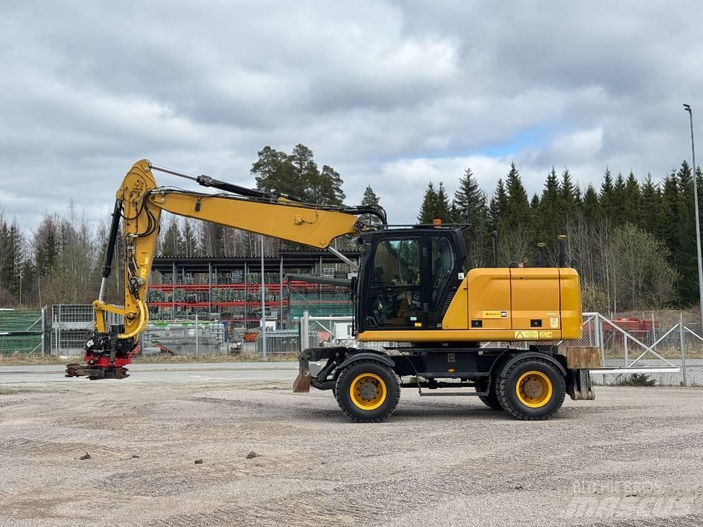 CAT M 318 Ekskavatori uz riteņiem