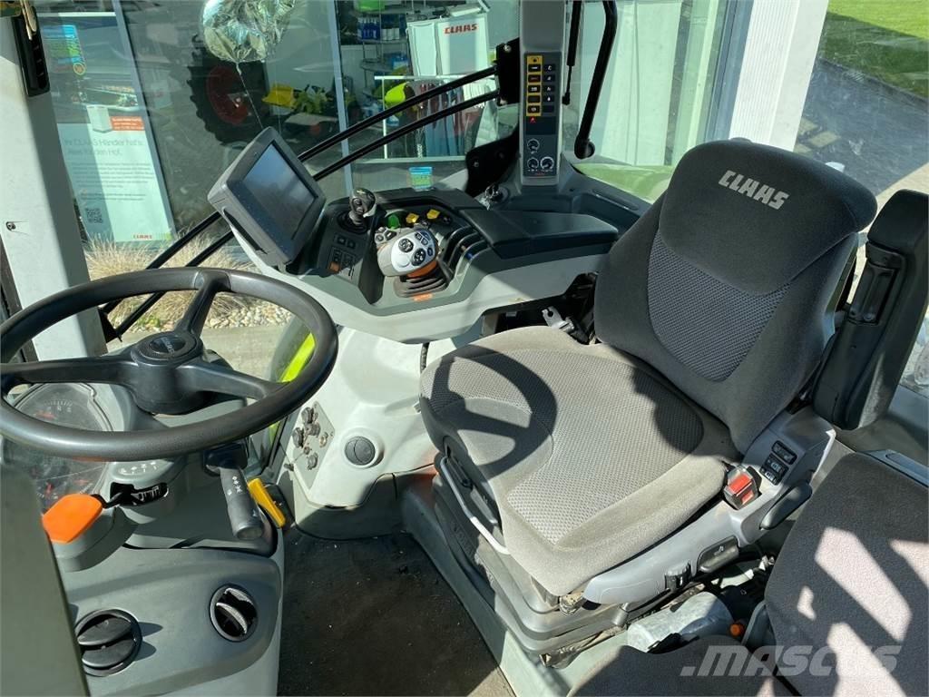 CLAAS AXION 810 Traktori
