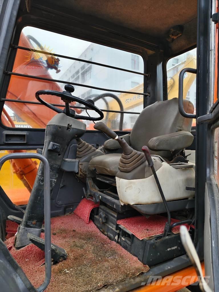 Hitachi EX 100 W D Ekskavatori uz riteņiem