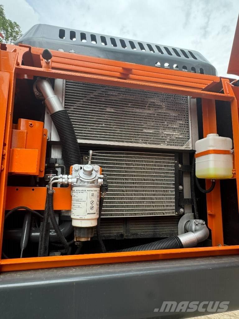 Doosan DX 225 LCA Vidēja lieluma ekskavatori 7 t - 12 t