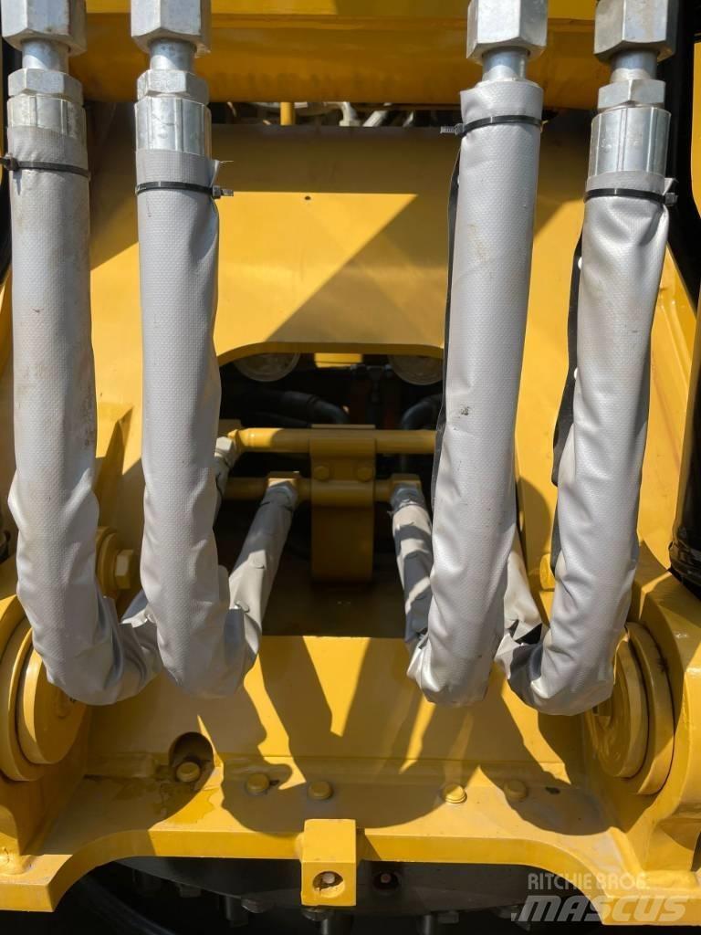 CAT 320 GC Ekskavatori uz riteņiem