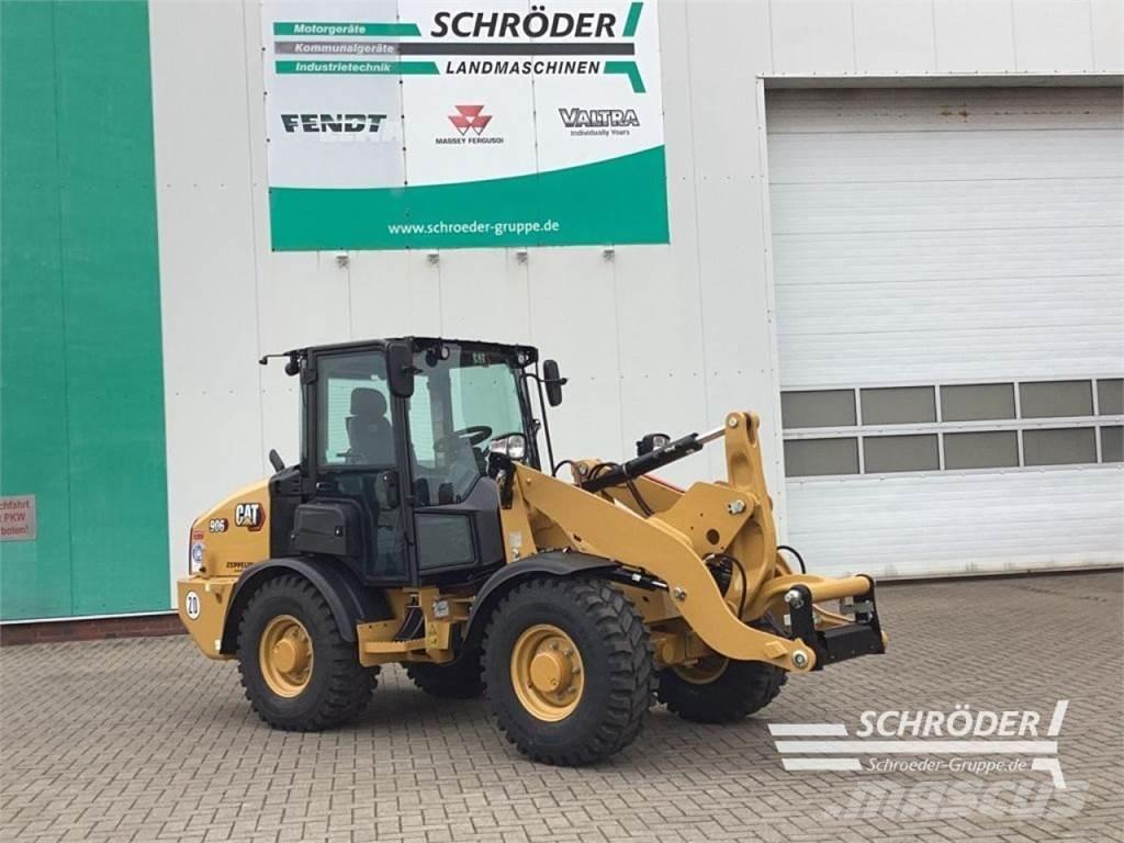 CAT 906 Iekrāvēji uz riteņiem
