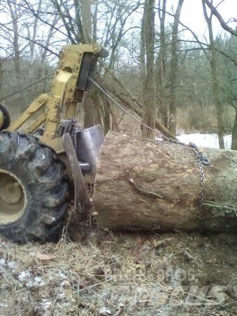 CAT 515 Skidder Lietoti riteņu kompaktiekrāvēji