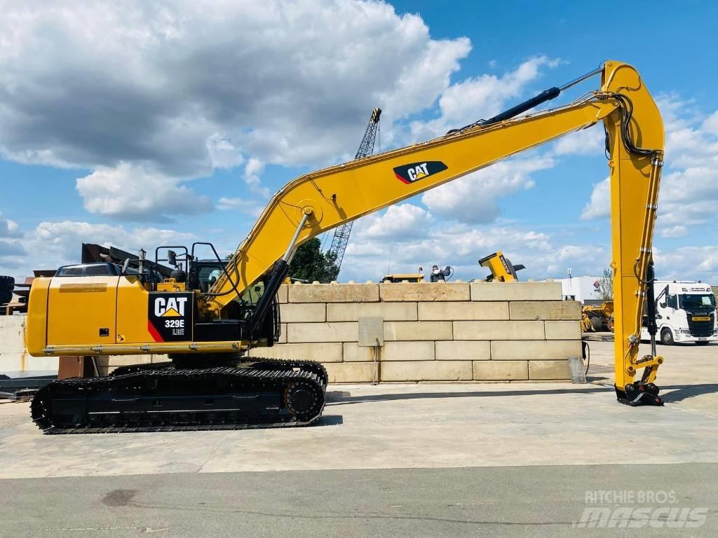 CAT 329e lre Ekskavatori tālās sniedzamības darbiem
