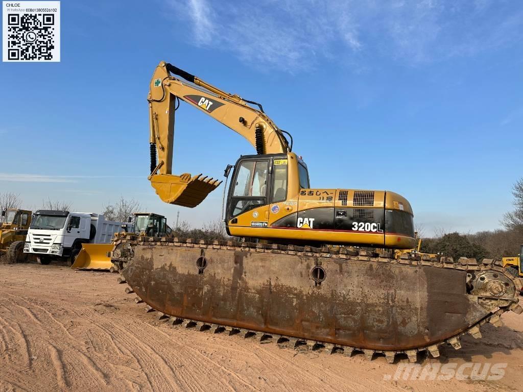 CAT 320 C L Amfībijas tipa ekskavatori