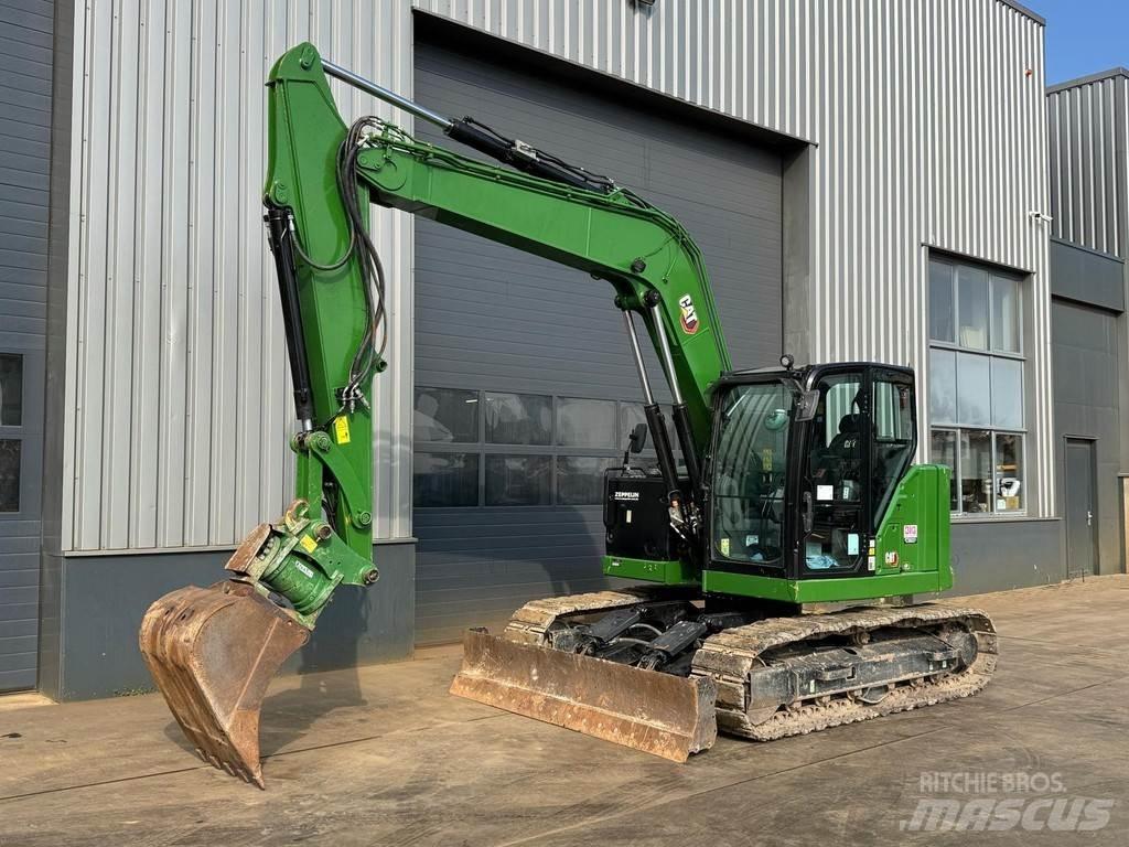 CAT 310 - 07A Vidēja lieluma ekskavatori 7 t - 12 t