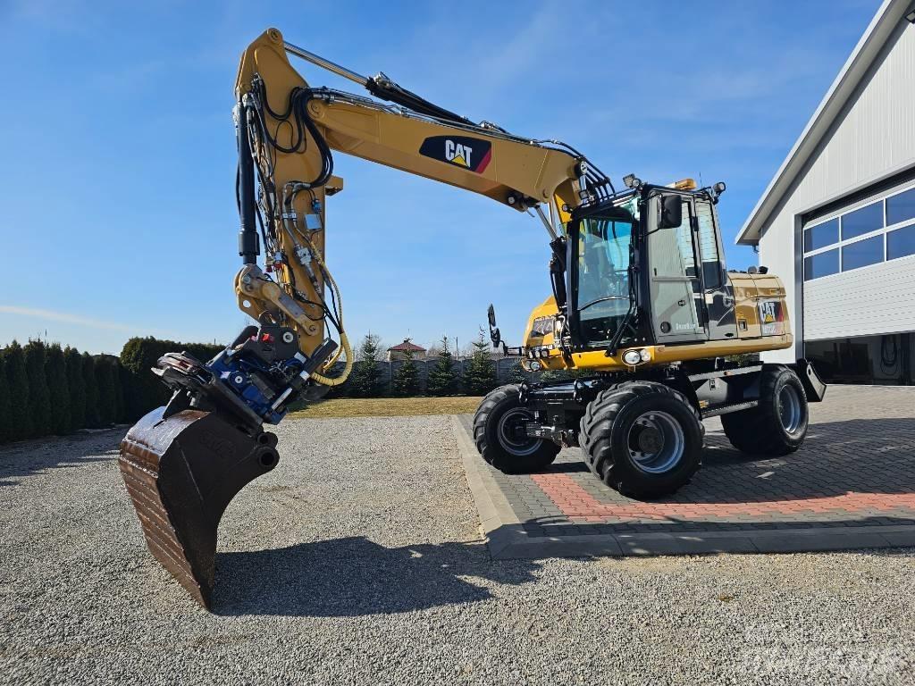 CAT M 313 D Ekskavatori uz riteņiem
