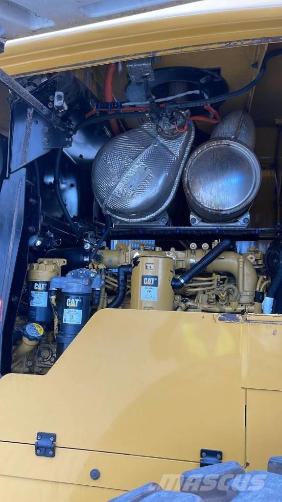 CAT 938M Iekrāvēji uz riteņiem