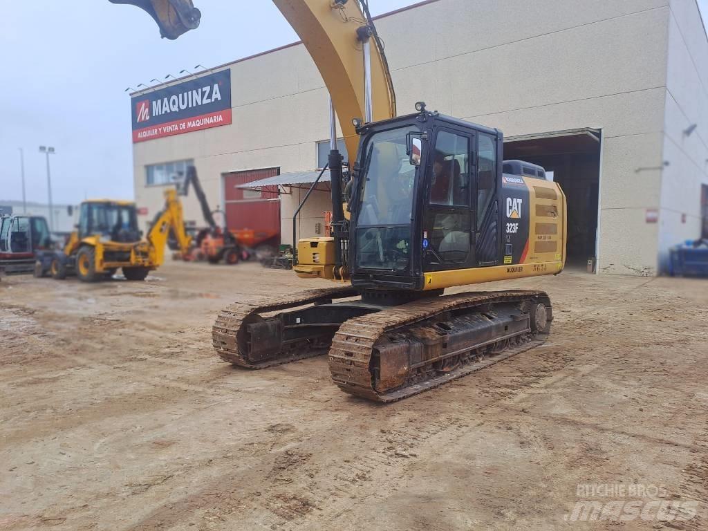 CAT 323FLN IHC Kāpurķēžu ekskavatori