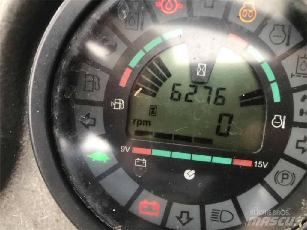 Mustang 406 Frontālie iekrāvēji un ekskavatori