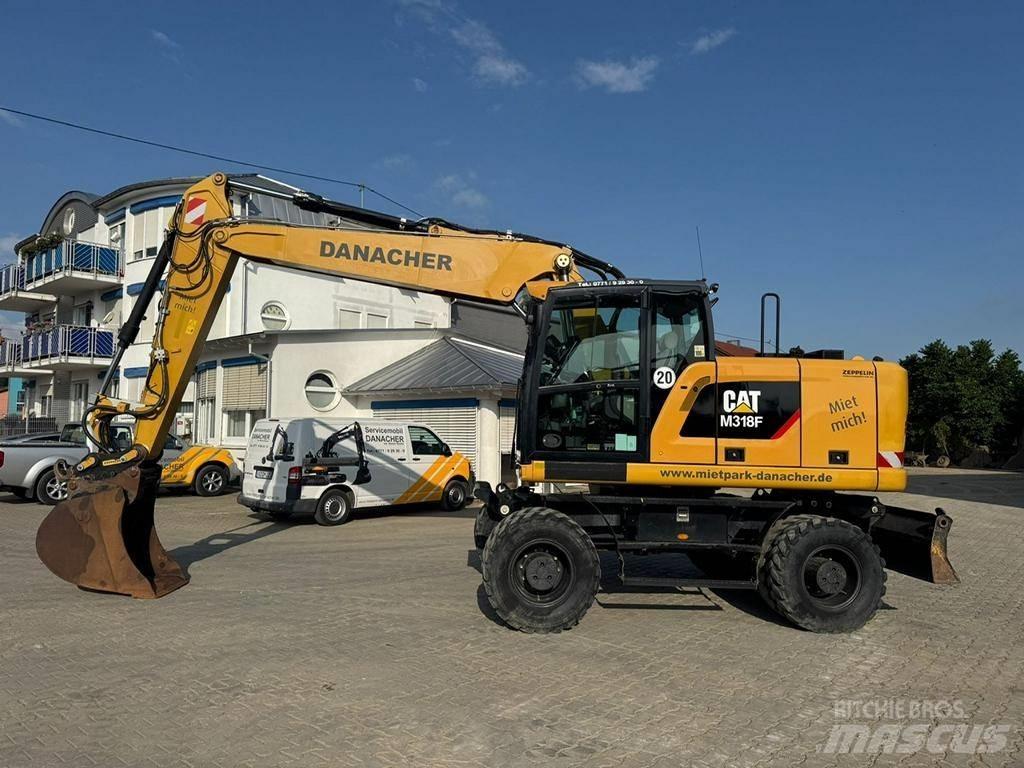 CAT M 318 F Ekskavatori uz riteņiem