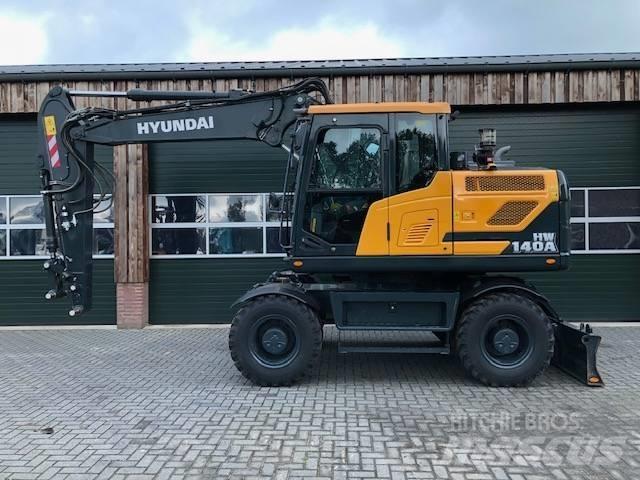 Hyundai HW140A Ekskavatori uz riteņiem
