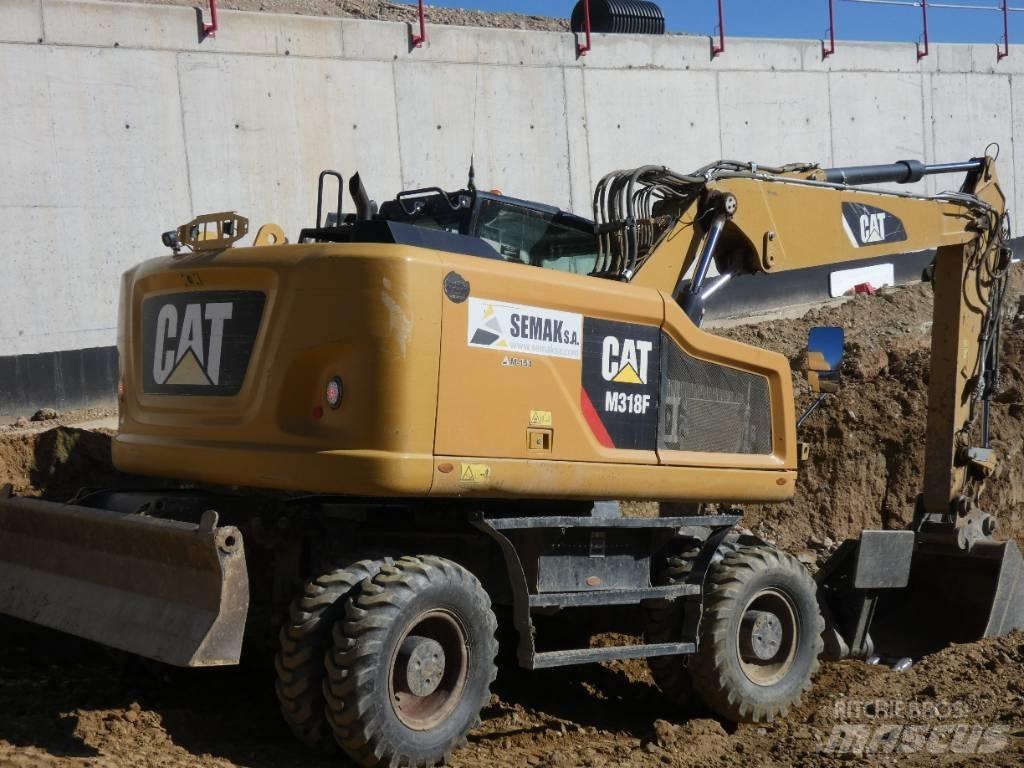 CAT M 318 F Ekskavatori uz riteņiem