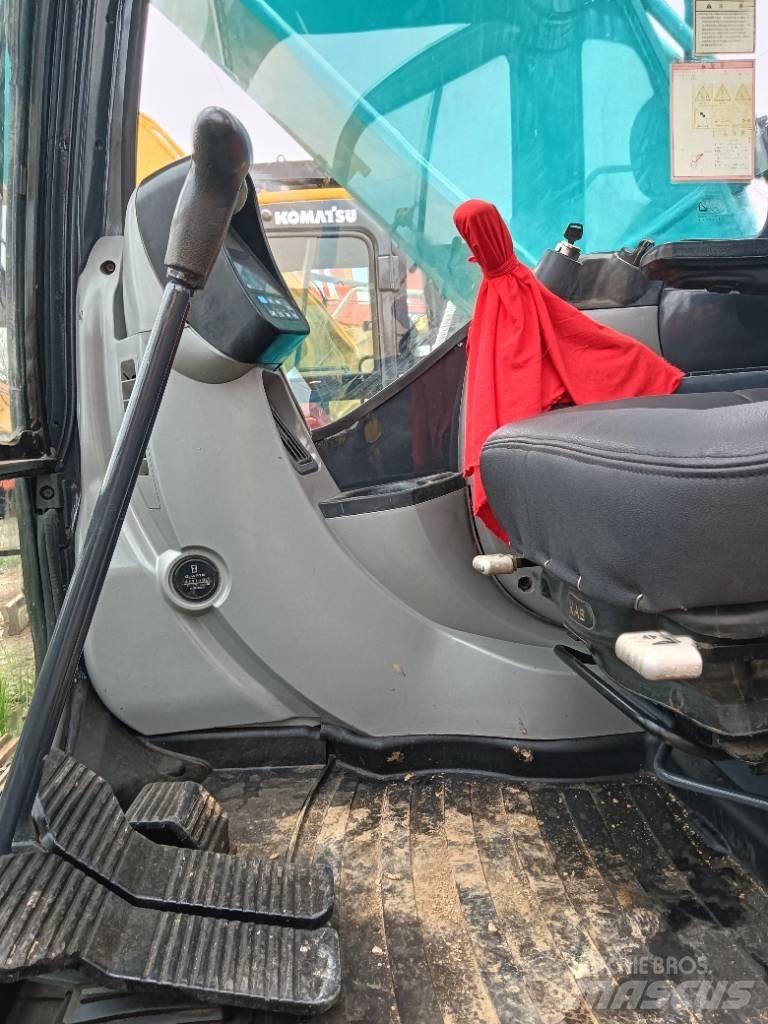 Kobelco SK 200 Vidēja lieluma ekskavatori 7 t - 12 t
