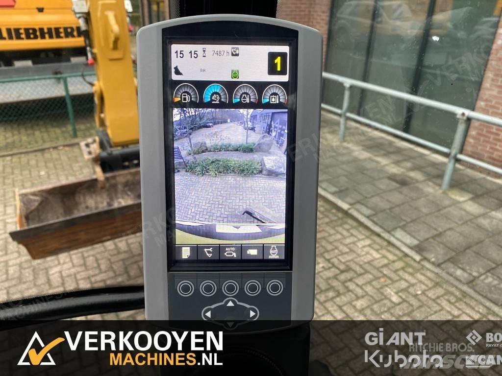 CAT M313D Ekskavatori uz riteņiem