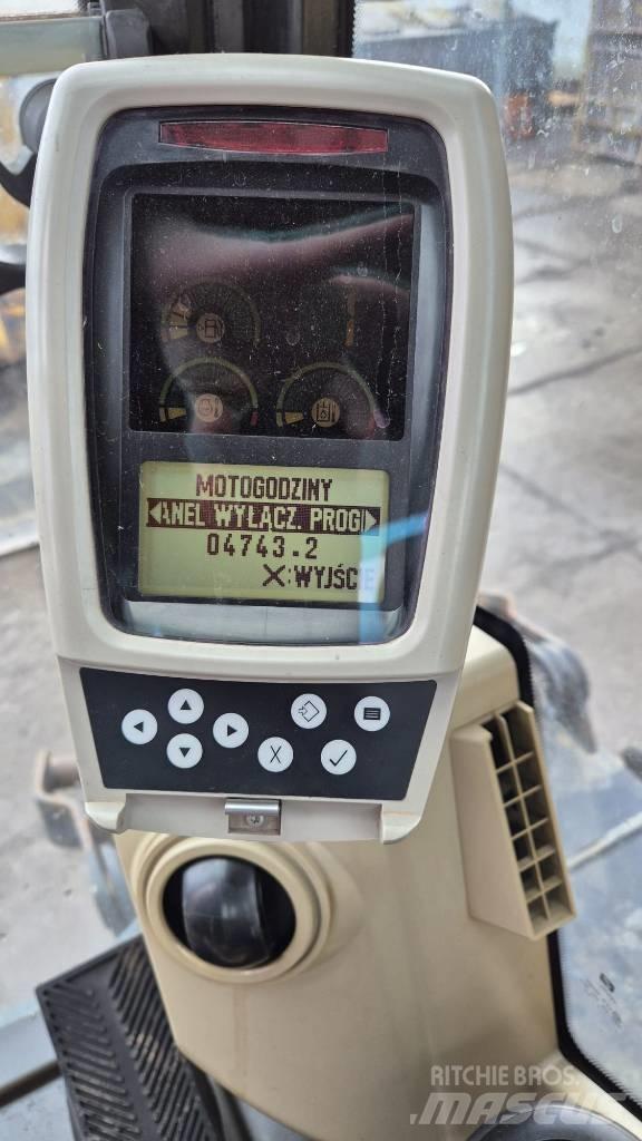 CAT M 315 C Ekskavatori uz riteņiem