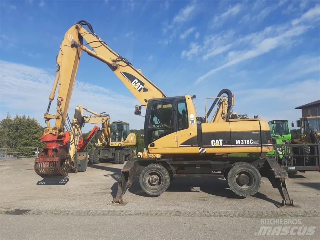 CAT M318C MH Ekskavatori uz riteņiem