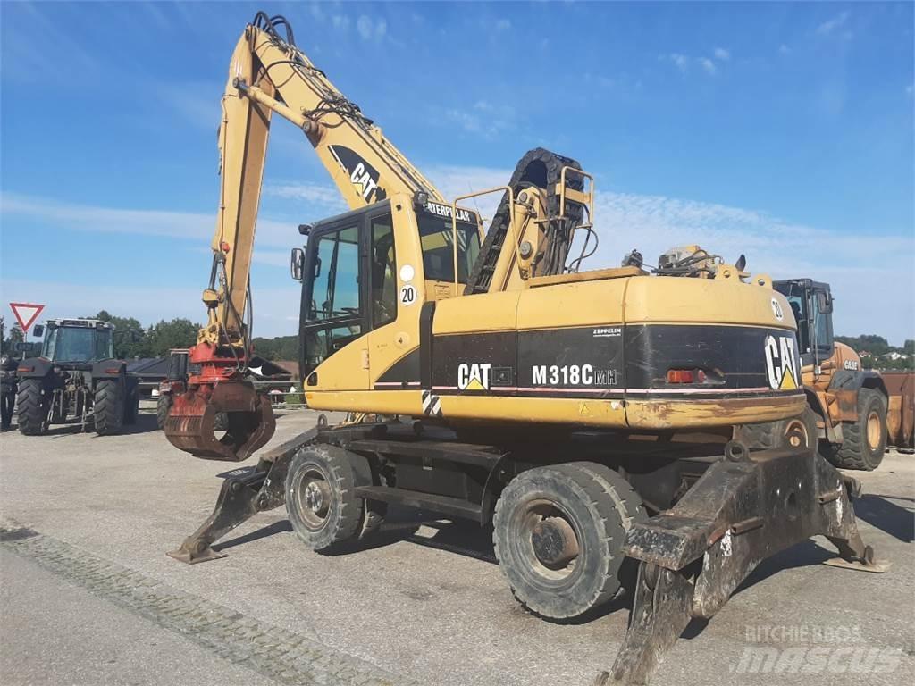 CAT M318C MH Ekskavatori uz riteņiem
