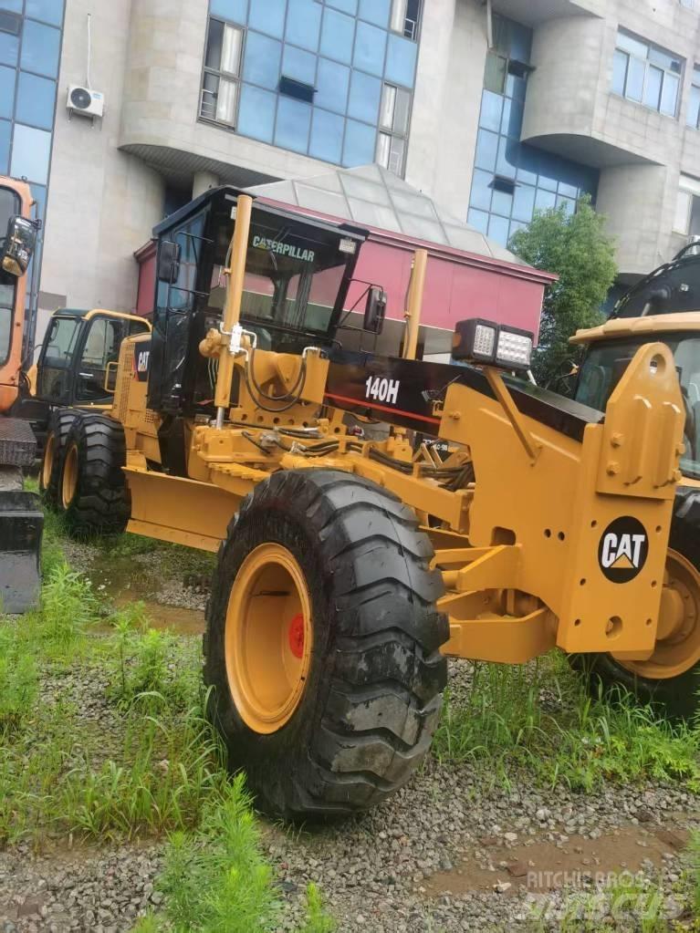 CAT 140 H Ekskavatori-iekrāvēji