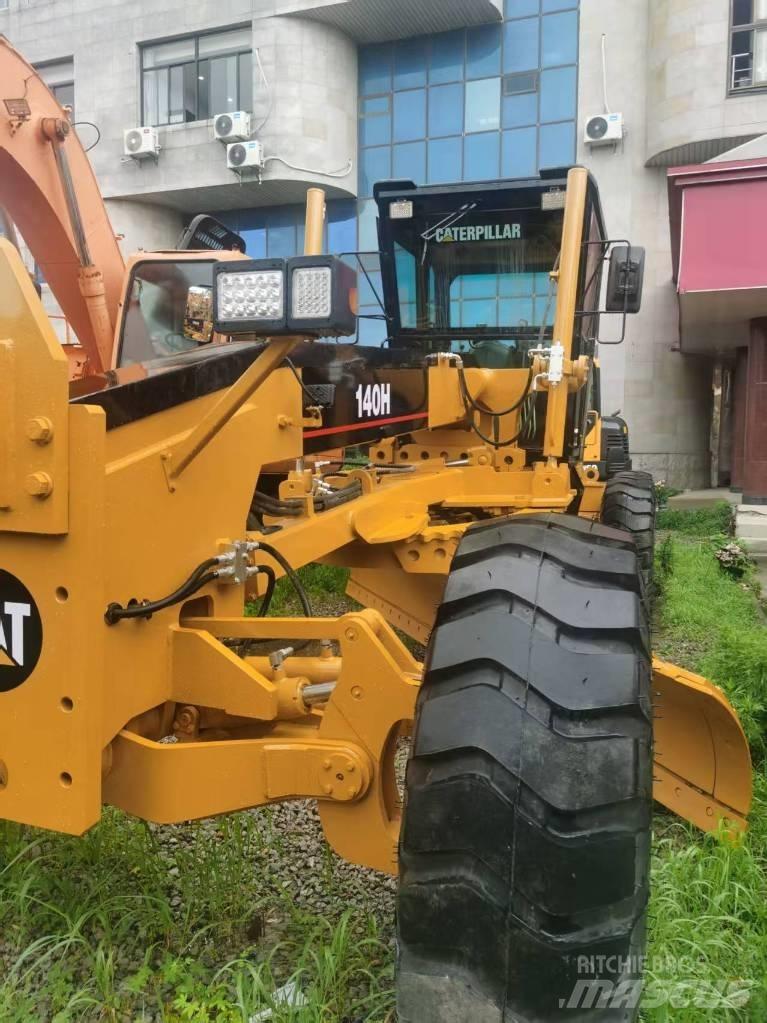 CAT 140 H Ekskavatori-iekrāvēji