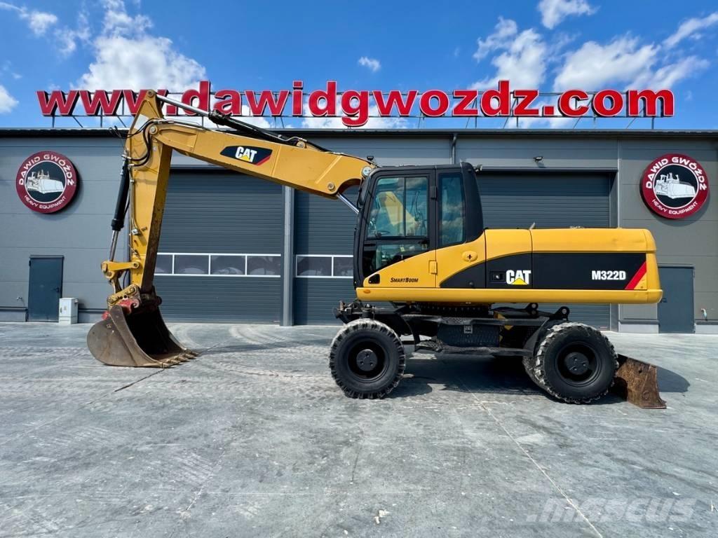 CAT M 322 D Ekskavatori uz riteņiem