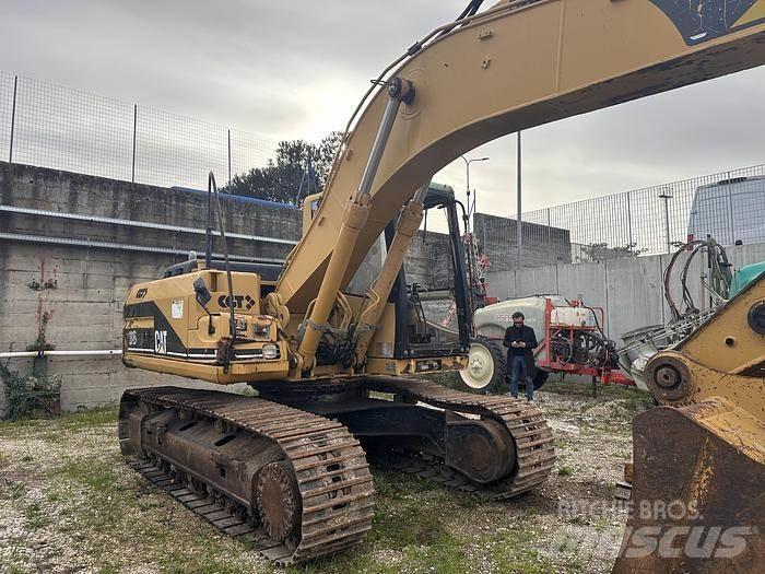 CAT 318B Īpašie ekskavatori