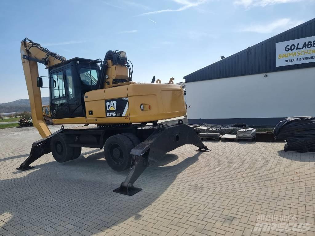 CAT 318D Industriālie iekrāvēji