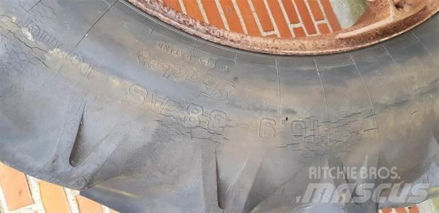  38 16.9-38 Riepas, riteņi un diski