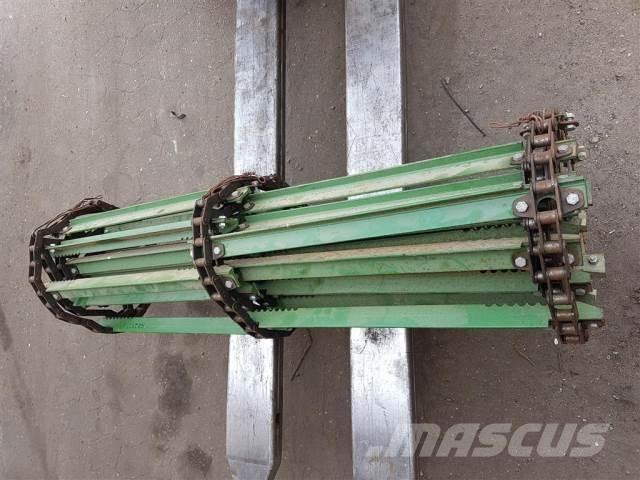John Deere 1075 Ražas novākšanas kombainu papildaprīkojums