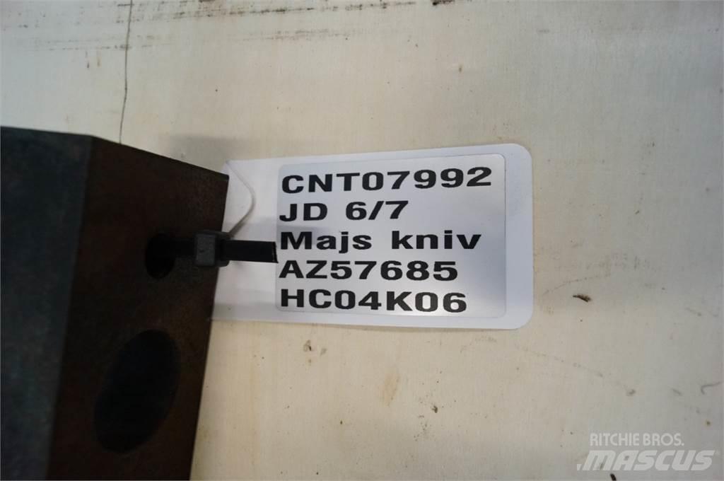 John Deere 6950 Siena un lopbarības novākšanas mašīnu piederumi